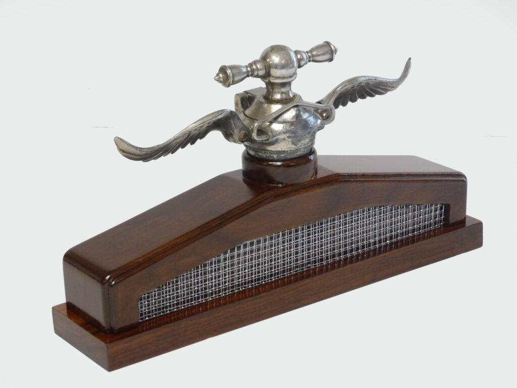 1920's Winged Radiator Cap on Walnut Base, 15x8, $625